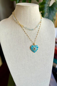 Necklace of faceted aquamarines with gold filled elements