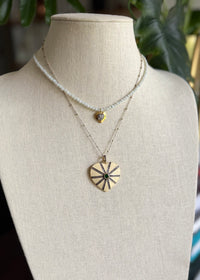 Necklace of faceted amazonite with gold vermeil and pave diamond pendant