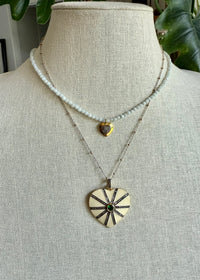 Necklace of faceted amazonite with gold vermeil and pave diamond pendant