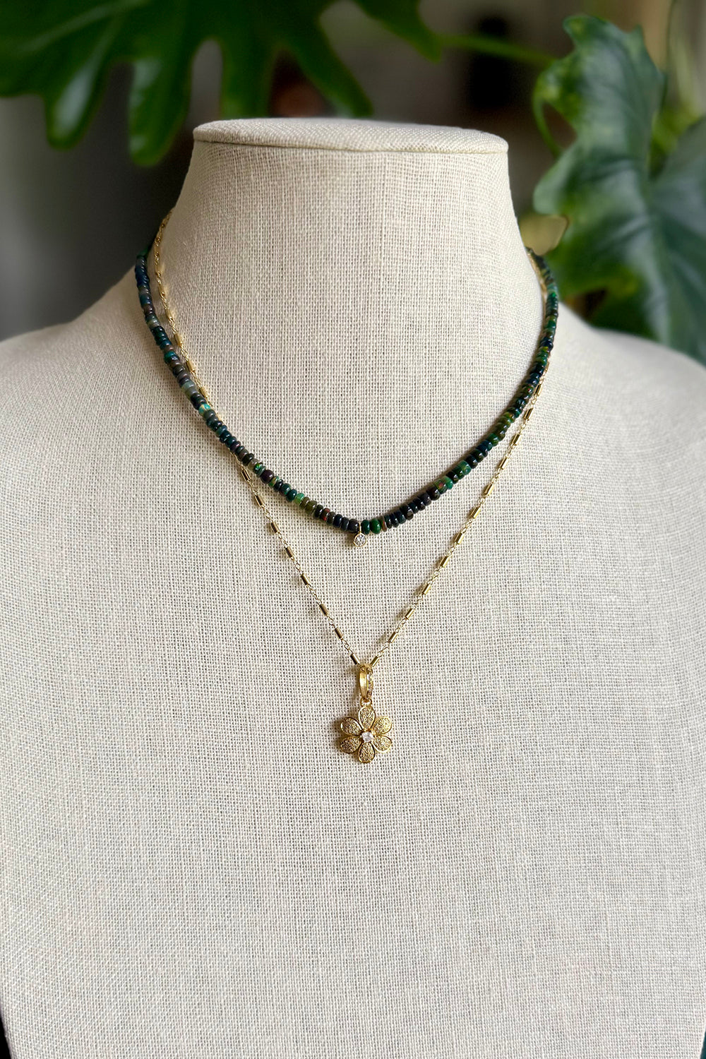 Necklace of 14K gold filled bar chain with gold vermeil and pave diamond flower pendant