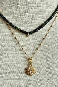 Necklace of 14K gold filled bar chain with gold vermeil and pave diamond flower pendant