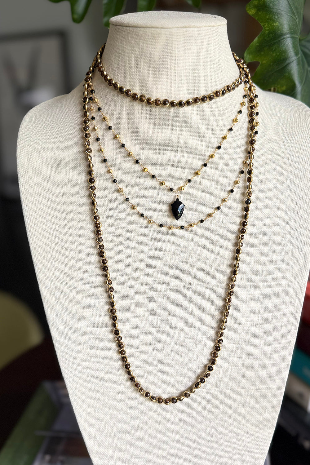 Double layer necklace of gold vermeil and black onyx with carved black onyx pendant
