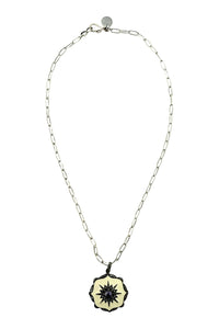 Necklace of oxidized sterling cable chain with cream enamel, and pave diamond pendant