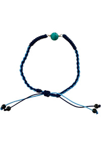 Adjustable bracelet of woven blue silk cord and turquoise