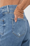 Anessa Wide Leg Jean with Set In Pockets & Raw Hem in Sunnie Distressed