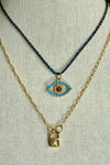 Gold Vermeil, Turquoise, Ruby and Diamond Evil Eye on Multi-Colored Silk Cord
