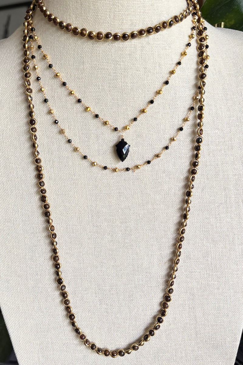 Double layer necklace of gold vermeil and black onyx with carved black onyx pendant
