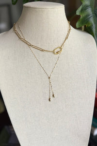 Necklace of 14K gold dapped chain with melon beads