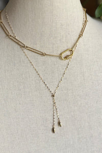 Necklace of 14K gold dapped chain with melon beads