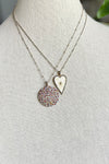 Necklace of pave diamond and gemstone pendant on two tone silver and gold bead chain