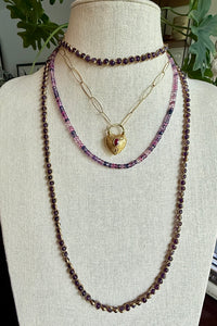 Fine faceted pink and purple sapphires on gold filled elements