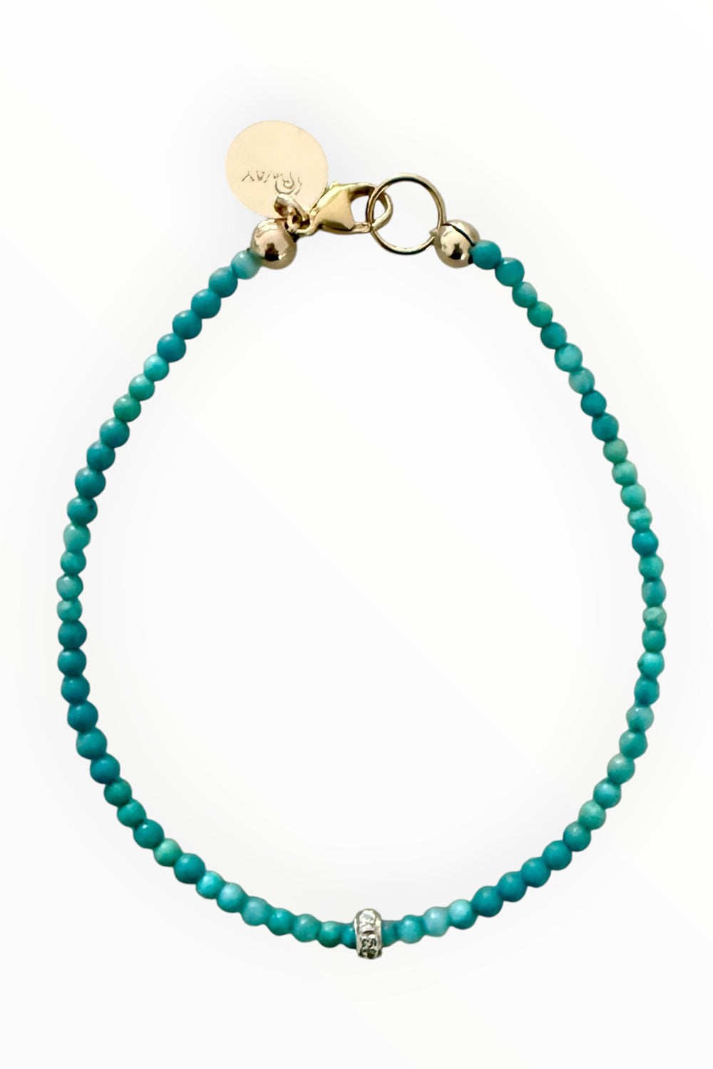 Bracelet of 2mm turquoise and gold vermeil and pave diamond wheel