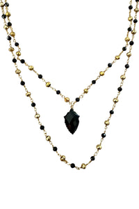 Double layer necklace of gold vermeil and black onyx with carved black onyx pendant