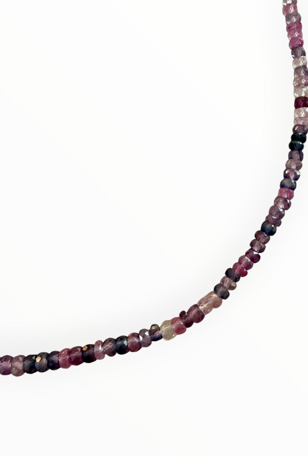 Fine faceted pink and purple sapphires on gold filled elements