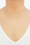 Necklace of 14K gold dapped chain with melon beads